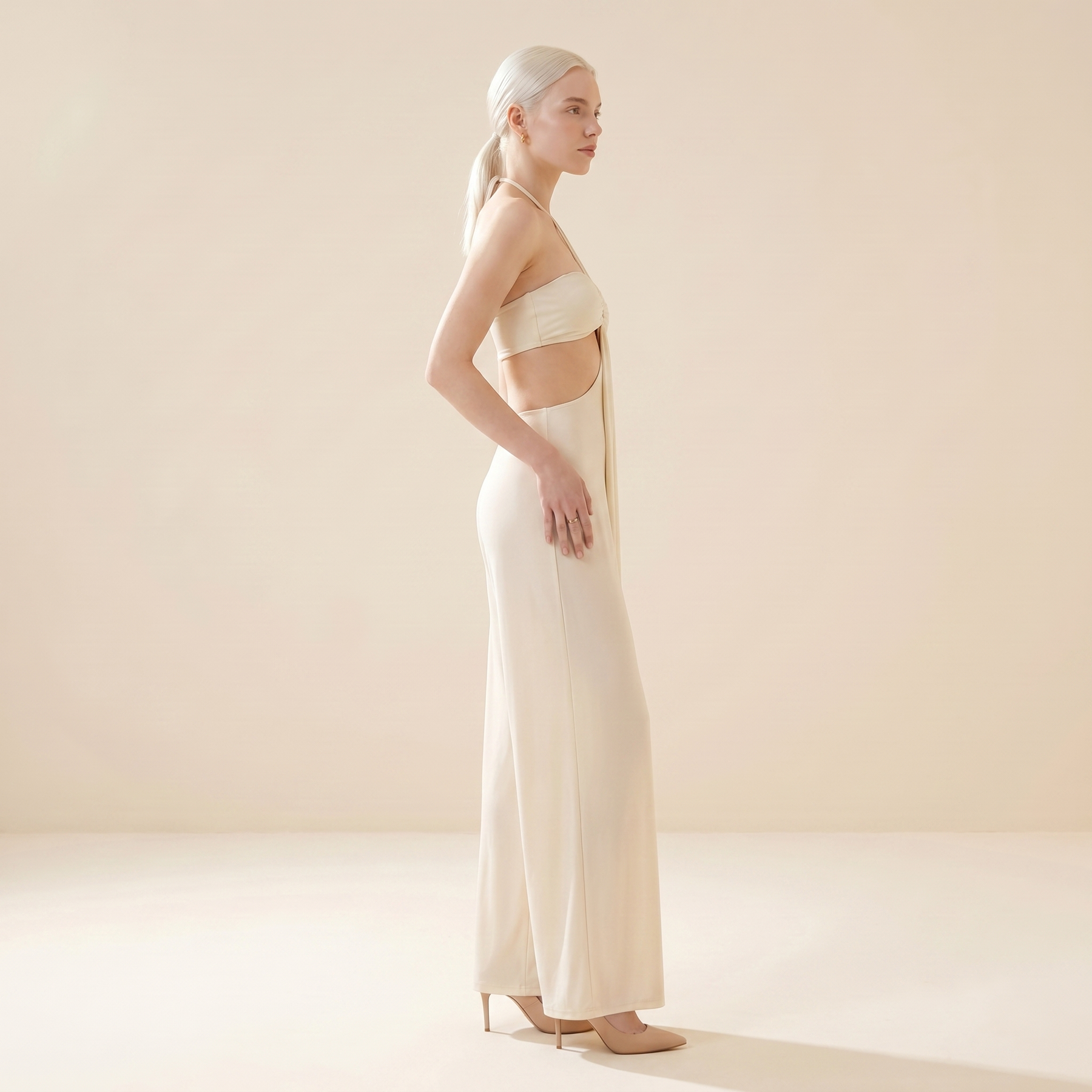 Sunoire tareth halterneck cutout jumpsuit 2 side view 01