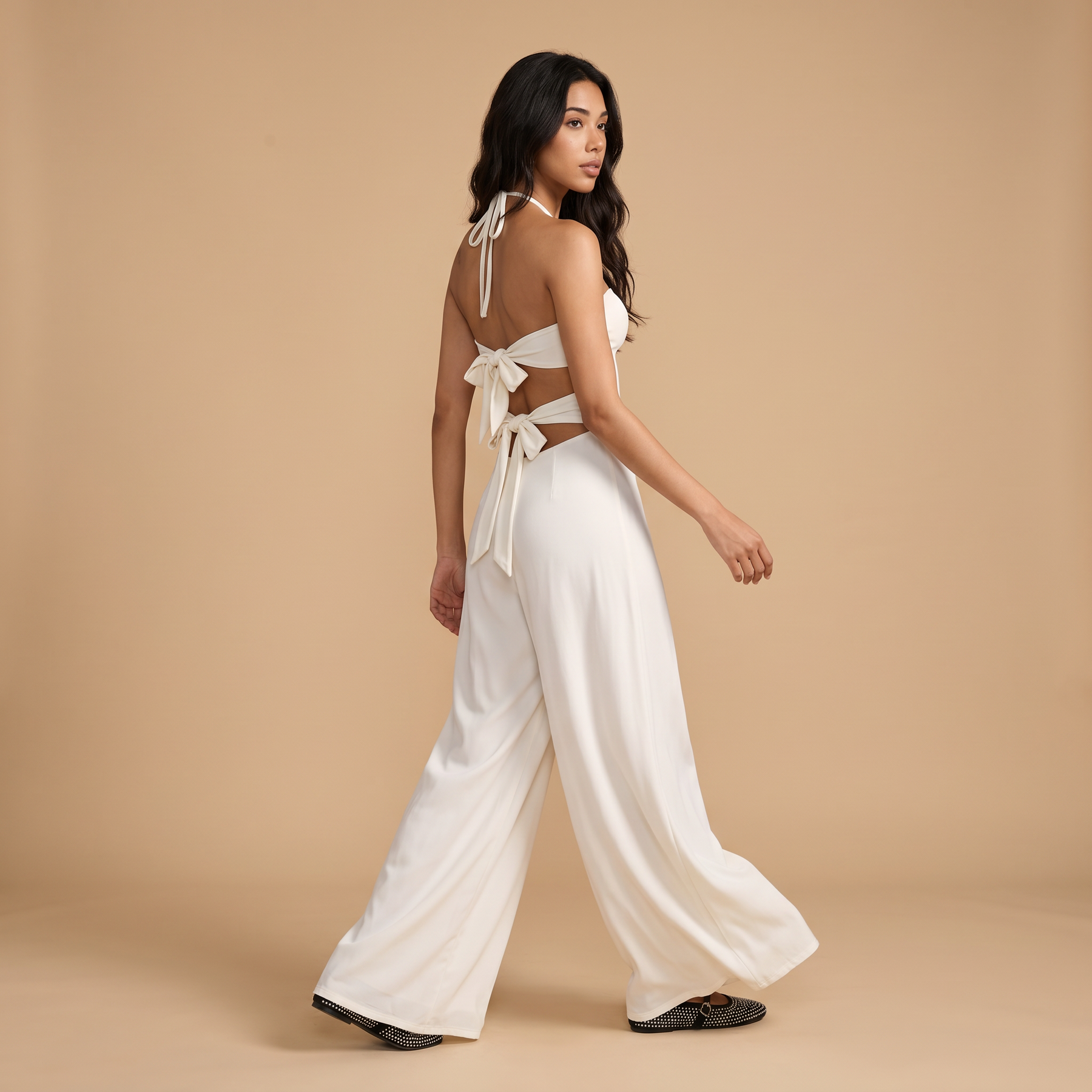 Sunoire tareth halterneck cutout jumpsuit 2 walking 01