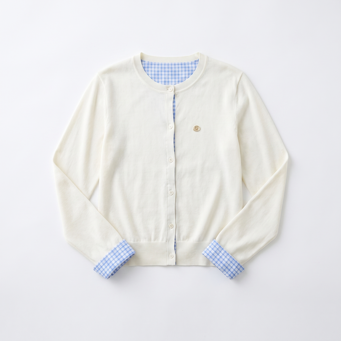 Sunoire vega chang white crew neck blue plaid contrast placket cuff knit cardigan for women fake two piece design small embroidery garment flatlay 01