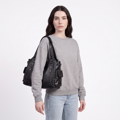 Slouchy Faux Leather Shoulder Bag, worn by a model