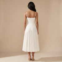 Sunoire white pleated cotton godet midi dress back view 01