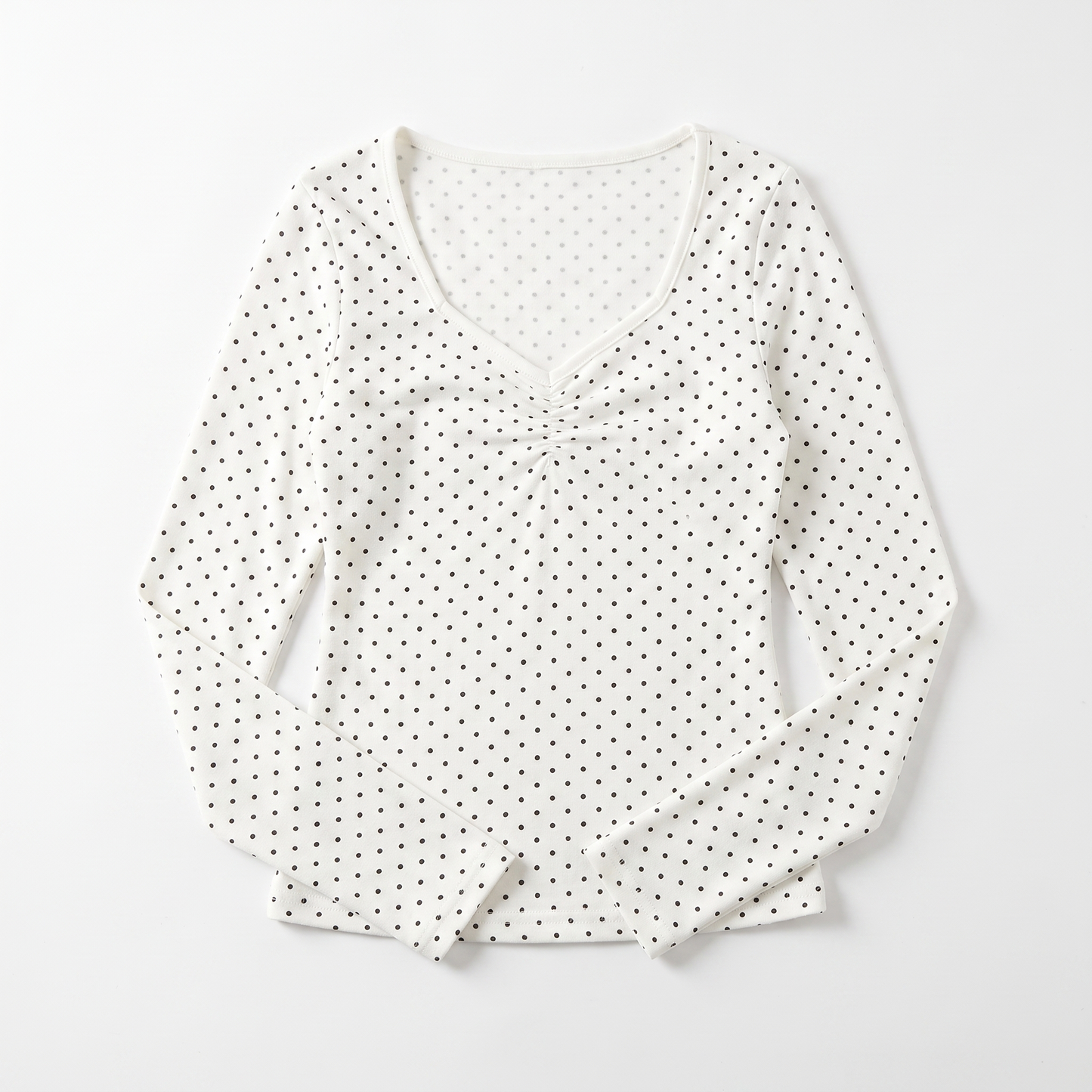 Sunoire white polka dot ruched vneck top garment flatlay 01