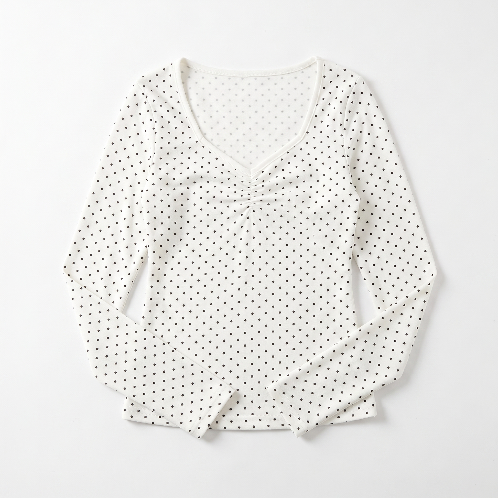 Sunoire white polka dot ruched vneck top garment flatlay 01
