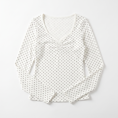 Sunoire white polka dot ruched vneck top garment flatlay 01