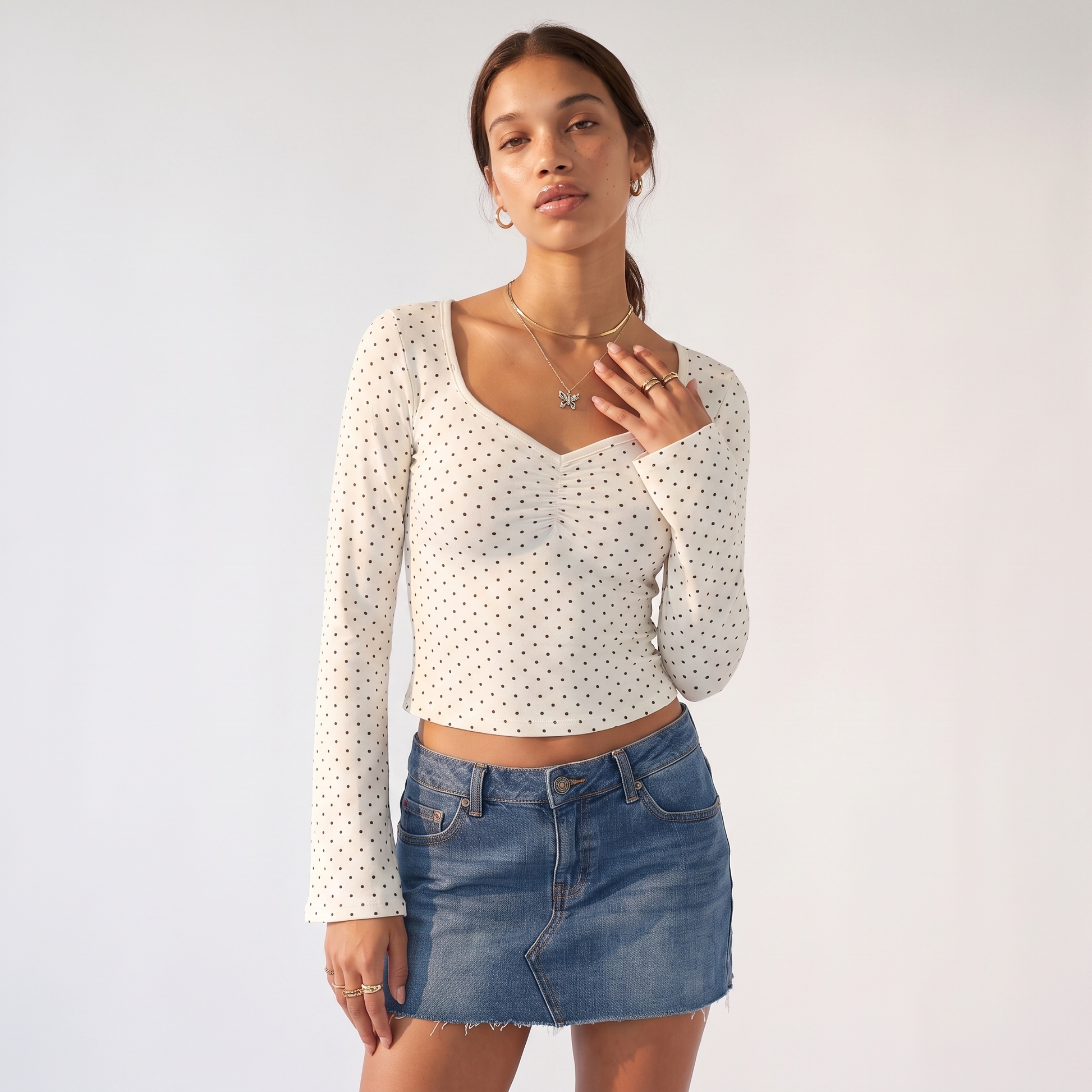 Sunoire white polka dot ruched vneck top top front crop 01