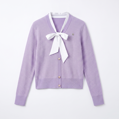 Sunoire women cropped v neck knit cardigan white bow tie waffle texture pearl button long sleeve elegant purple sweater jacket garment flatlay 01