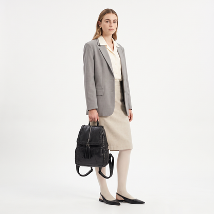 Women's Faux Leather Braided Flap Backpack, worn by a model