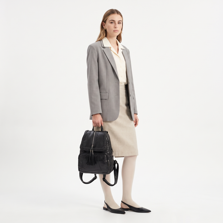 Women's Faux Leather Braided Flap Backpack, worn by a model