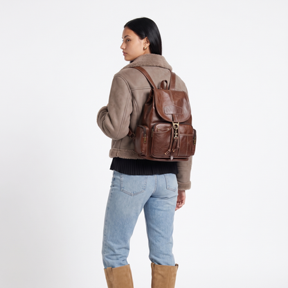 Women's Faux Leather Drawstring Backpack, worn from behind