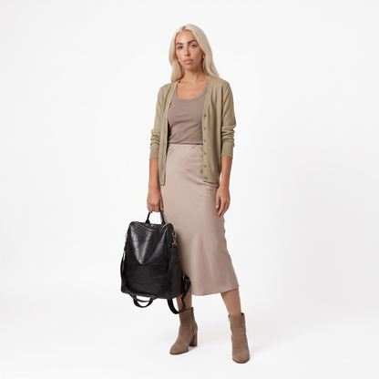 Women's Glossy Faux Leather Patchwork Backpack, worn by a model