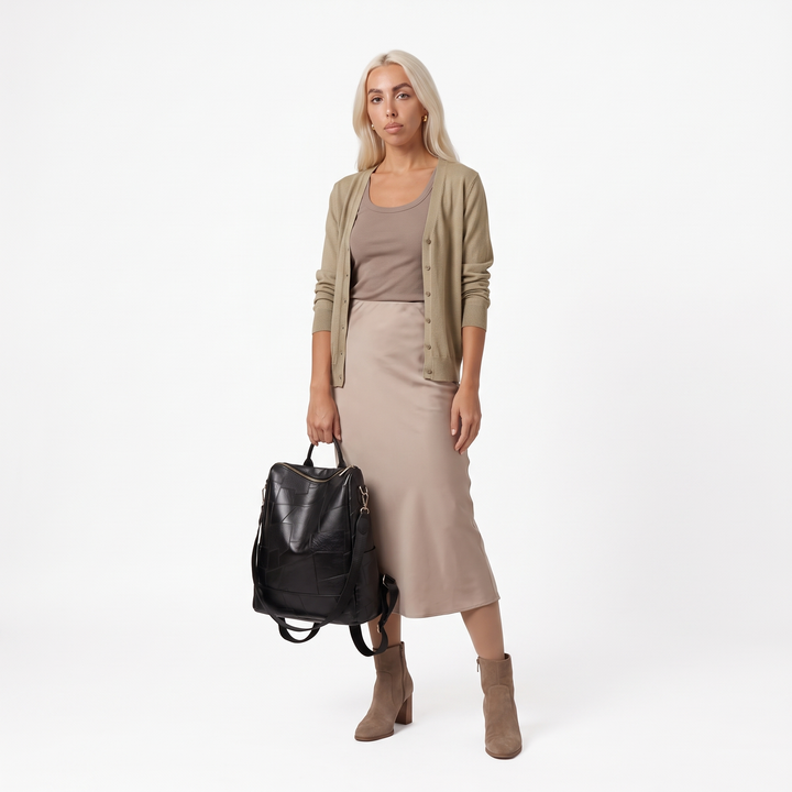 Women's Glossy Faux Leather Patchwork Backpack, worn by a model