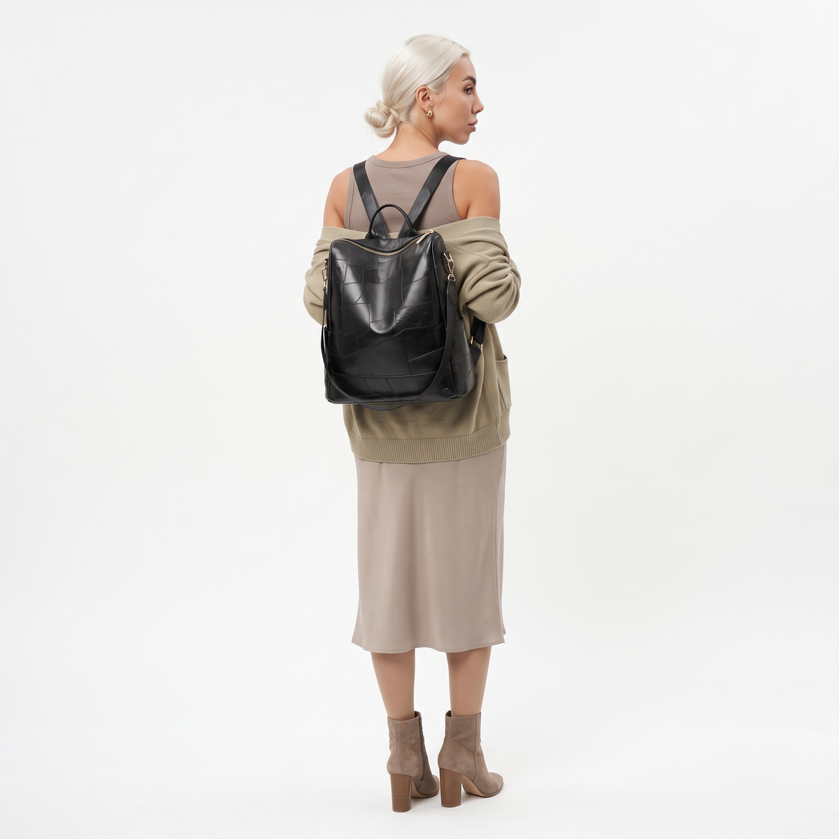 Women's Glossy Faux Leather Patchwork Backpack, worn from behind