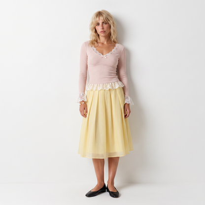 Sunoire women s lace trim v neck long sleeve top with petal cuffs and ruffled hem sweet bow design wholesale customized by manufacturer front hero 01