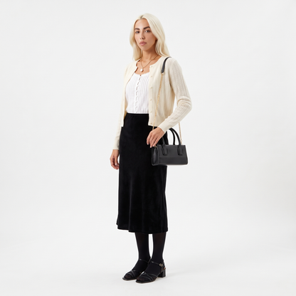 Women's Matte Faux Leather Mini Top Handle Bag, worn by a model