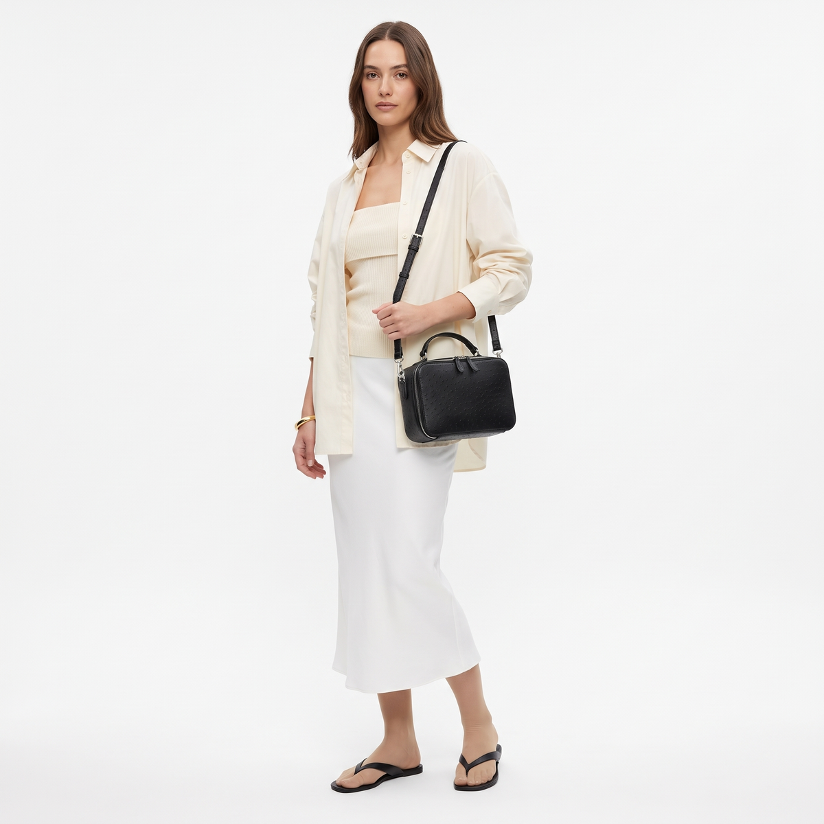 Women's Ostrich Faux Leather Pouch Bag, worn by a model