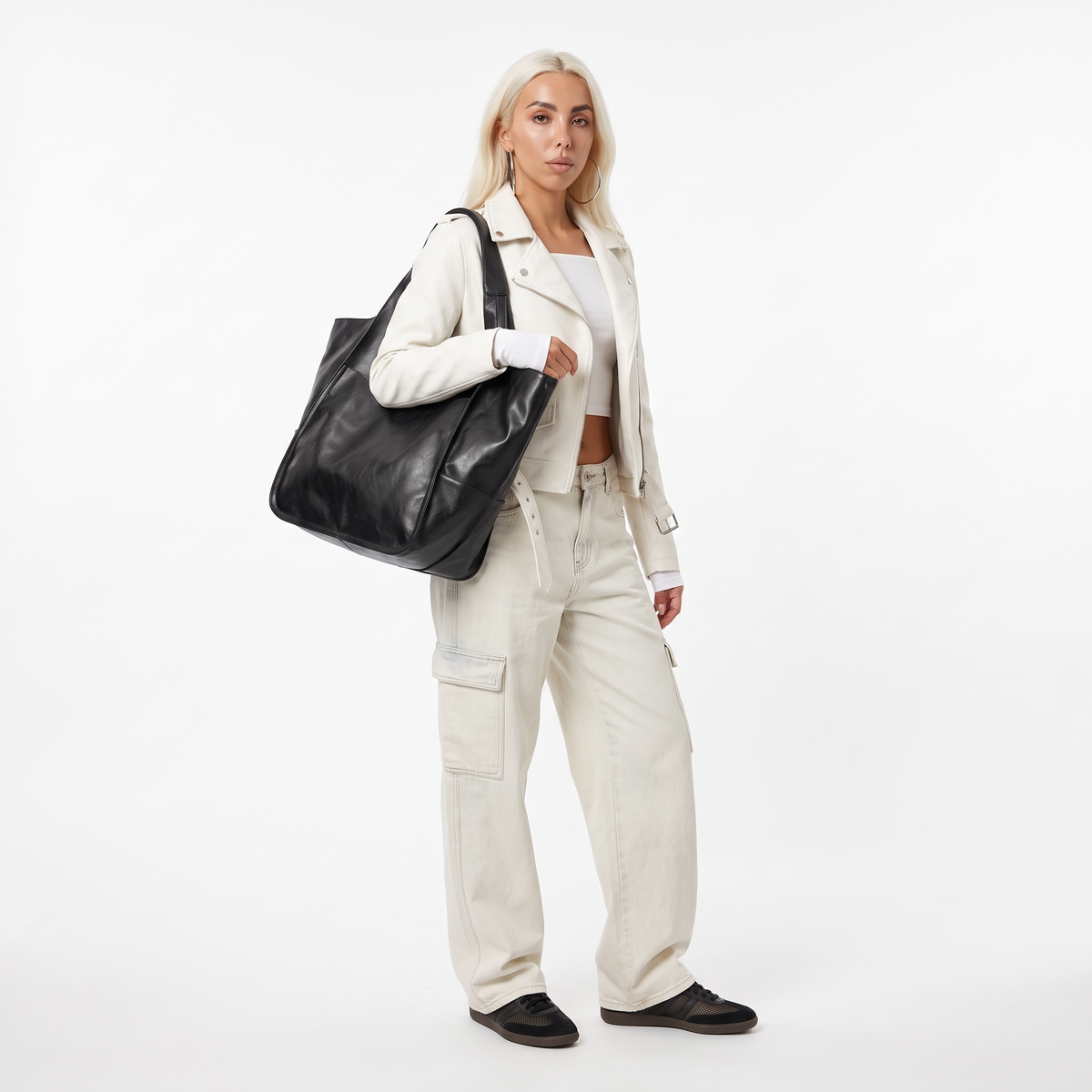 Women's Oversized Slouchy Faux Leather Tote Bag, worn by a model