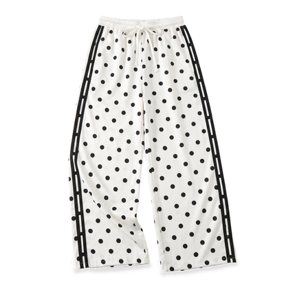Sunoire white polka dot side stripe track pants garment flatlay 01