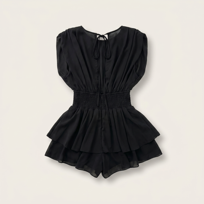 Sunoire womens backless ruffle hem skorts romper elegant tie back shirred pleated jumpsuit garment flatlay 01
