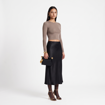 Women's Faux Leather Flap Clutch, worn by a model