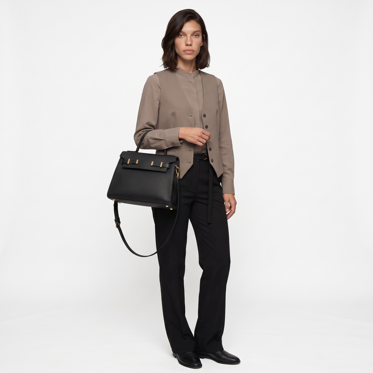 Women's Pebbled Faux Leather Top Handle Bag, worn by a model