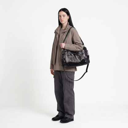 Women's Slouchy Vegan Leather Hobo Bag, worn by a model