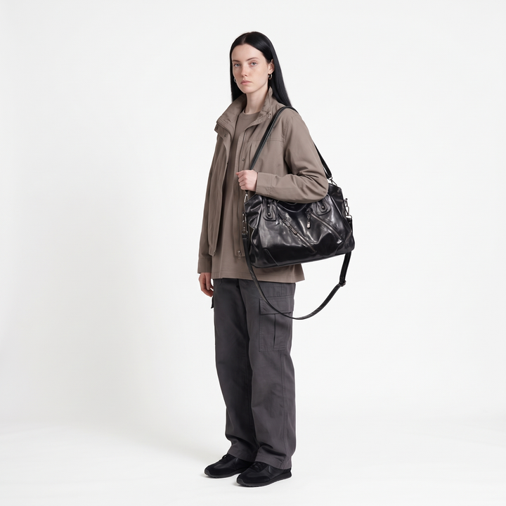 Women's Slouchy Vegan Leather Hobo Bag, worn by a model