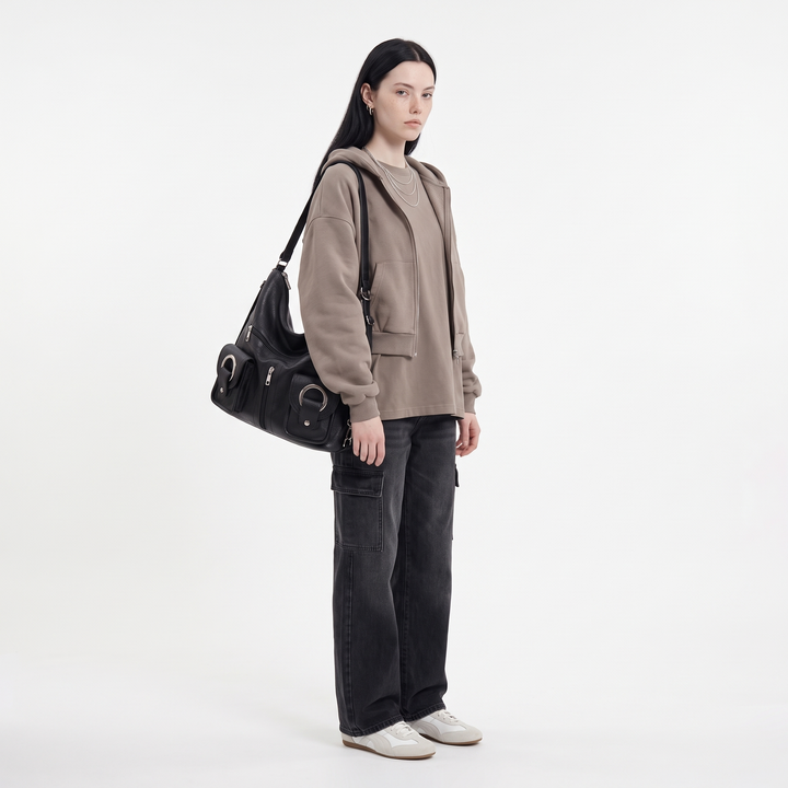 Women's Slouchy Vegan Leather Hobo Bag, worn by a model