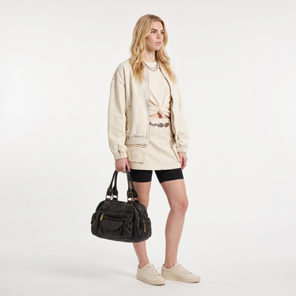 Women's Washed Faux Leather Bowling Bag, worn by a model