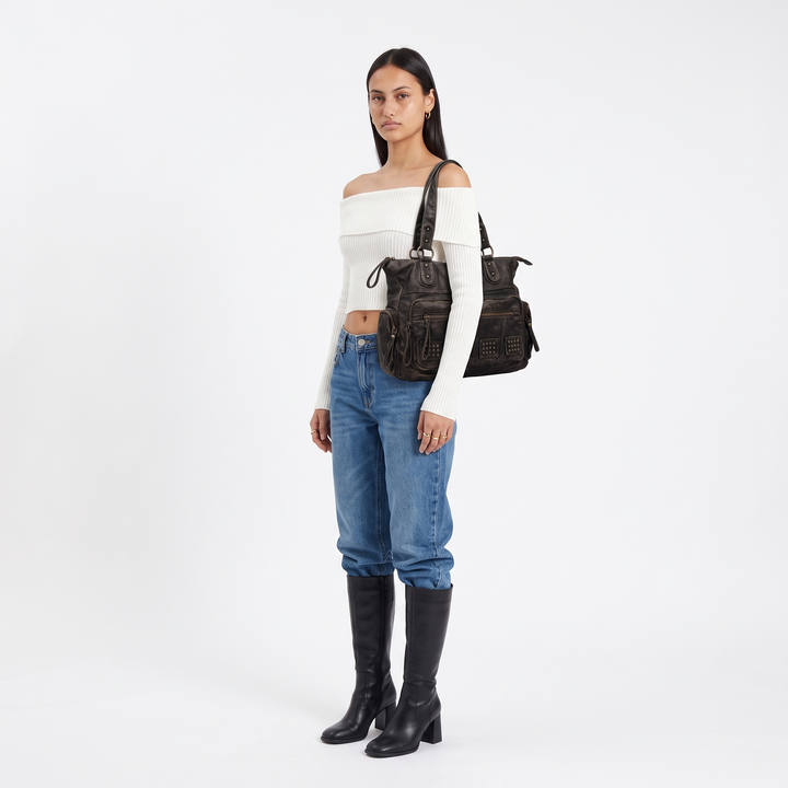 Women's Washed Faux Leather Studded Shoulder Bag, worn by a model