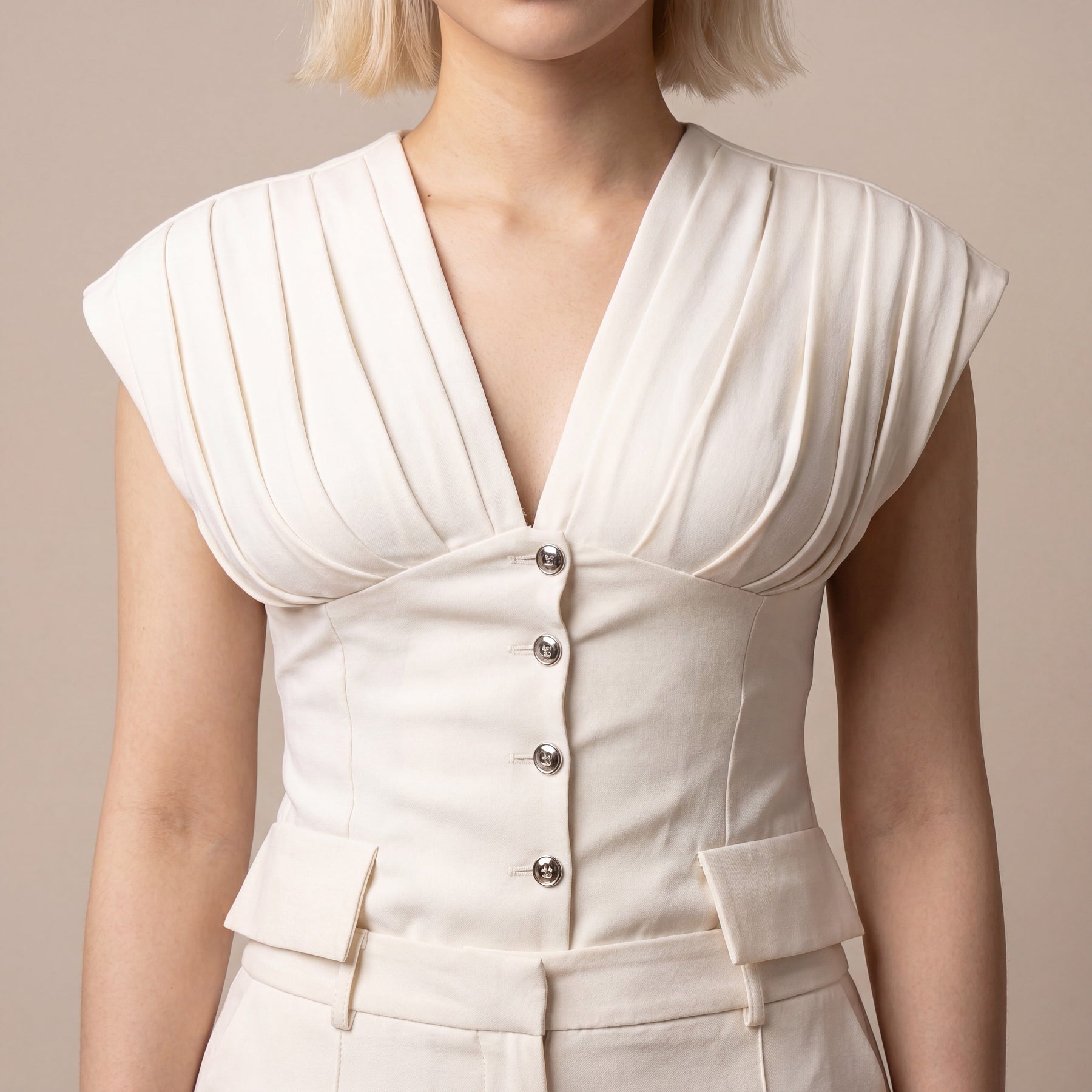 Sunoire 2 pieces outfit deep v neck sleeveless ruched button front flap detail backless cinched waist top and button decor seam front wide leg pants set worn detail 01
