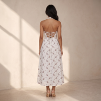 Sunoire zavethric halterneck lace up floral midi dress back view 01