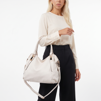 Women's Slouchy Faux Leather Plaque Hobo Bag, worn by a model